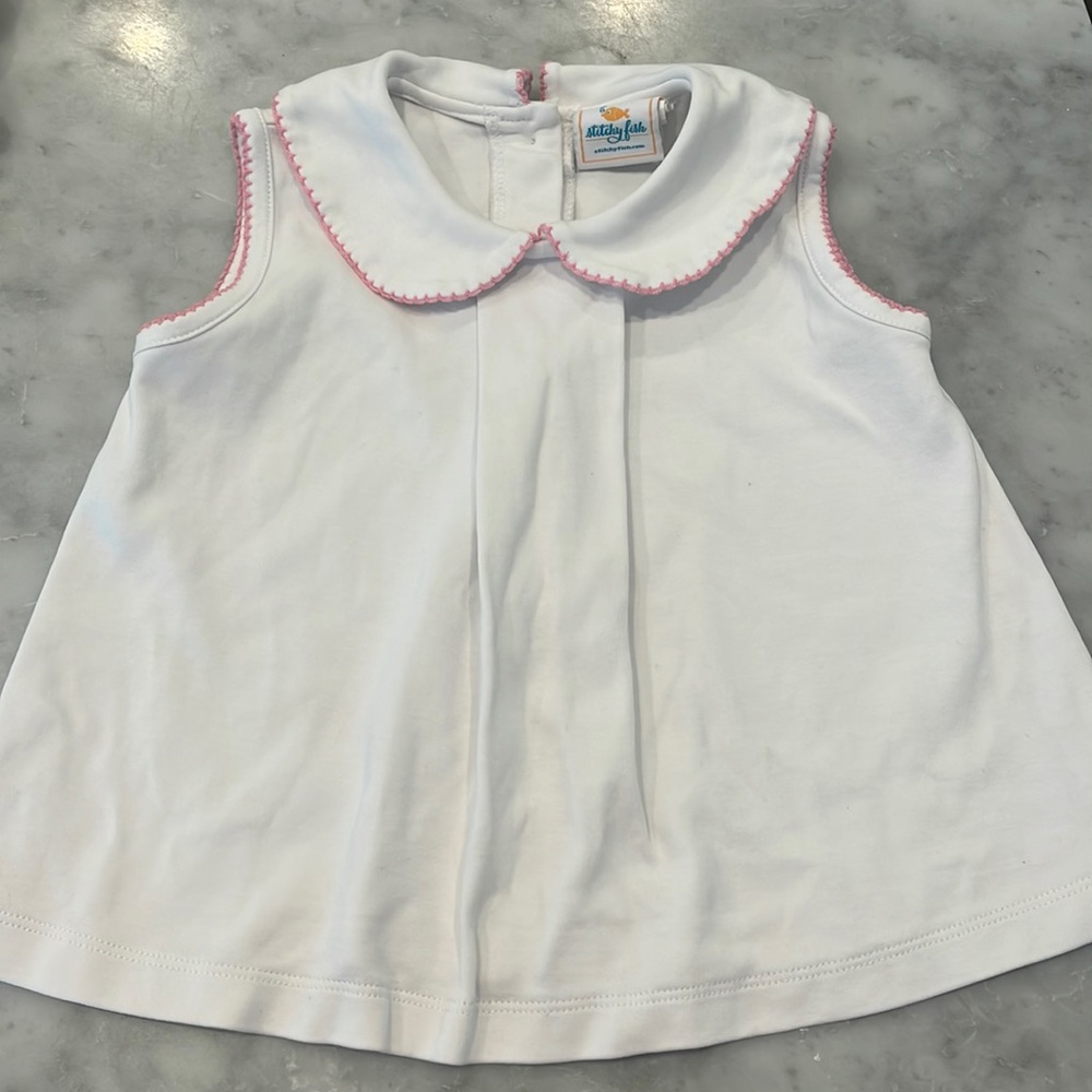 Stitchy Fish pink trim top